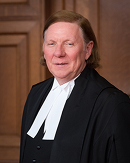 Malcolm Rowe in black robe