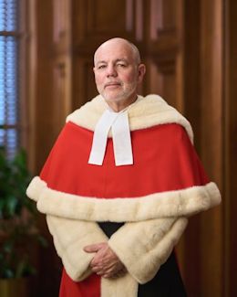 Russell Brown in red ceremonial robe