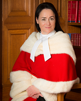 Suzanne Côté in red ceremonial robe