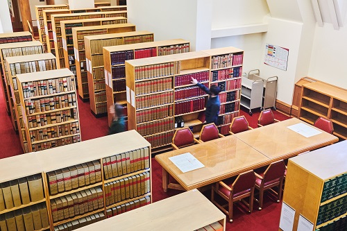 Employees in room C of the library