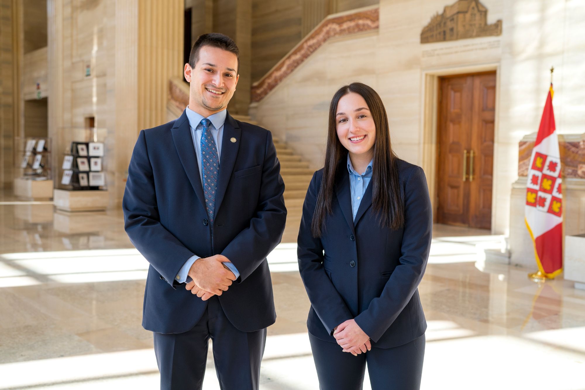 Two tour interpreters in the Grand Hall