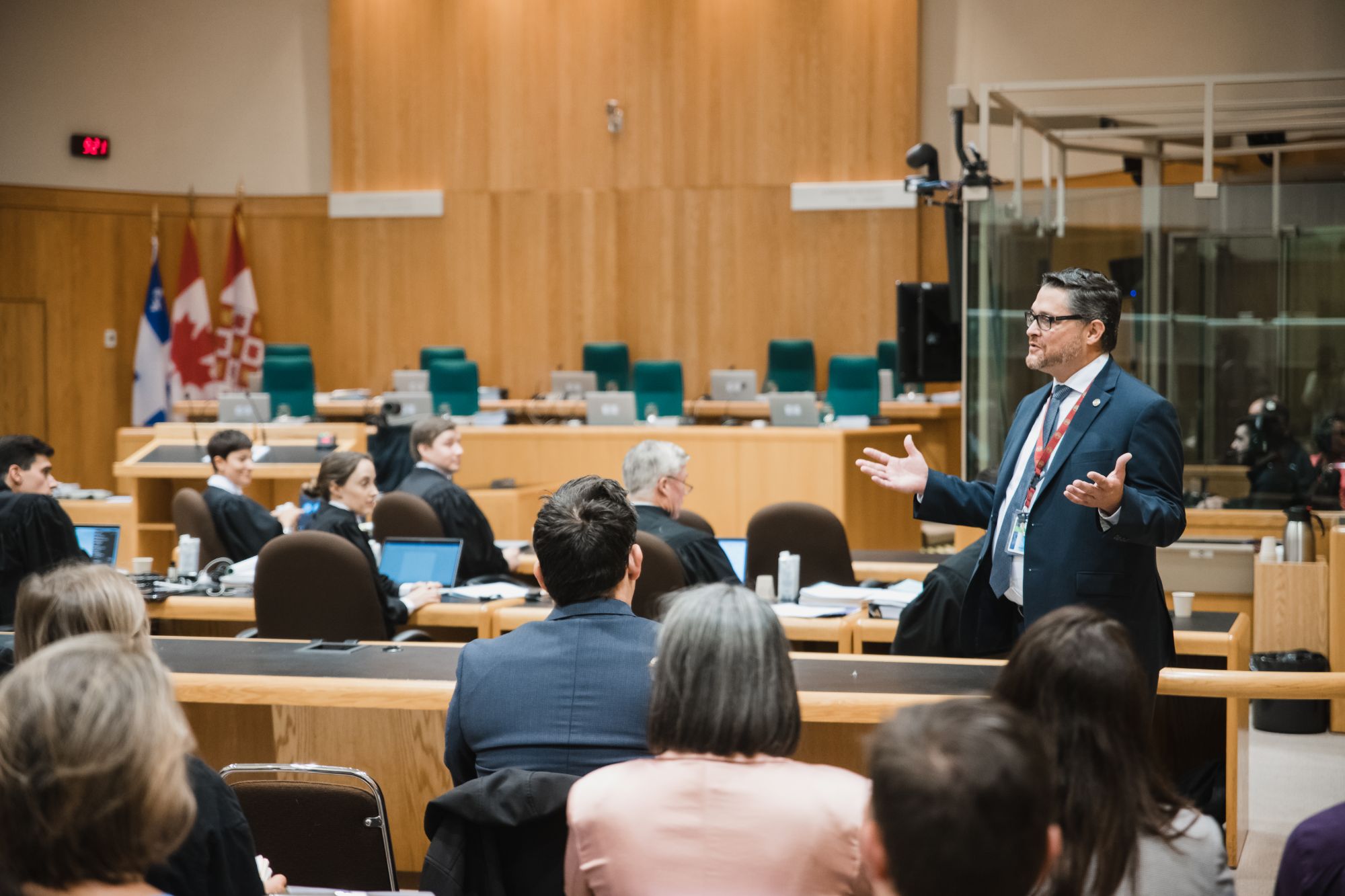 Mark Waito standing in a courtroom