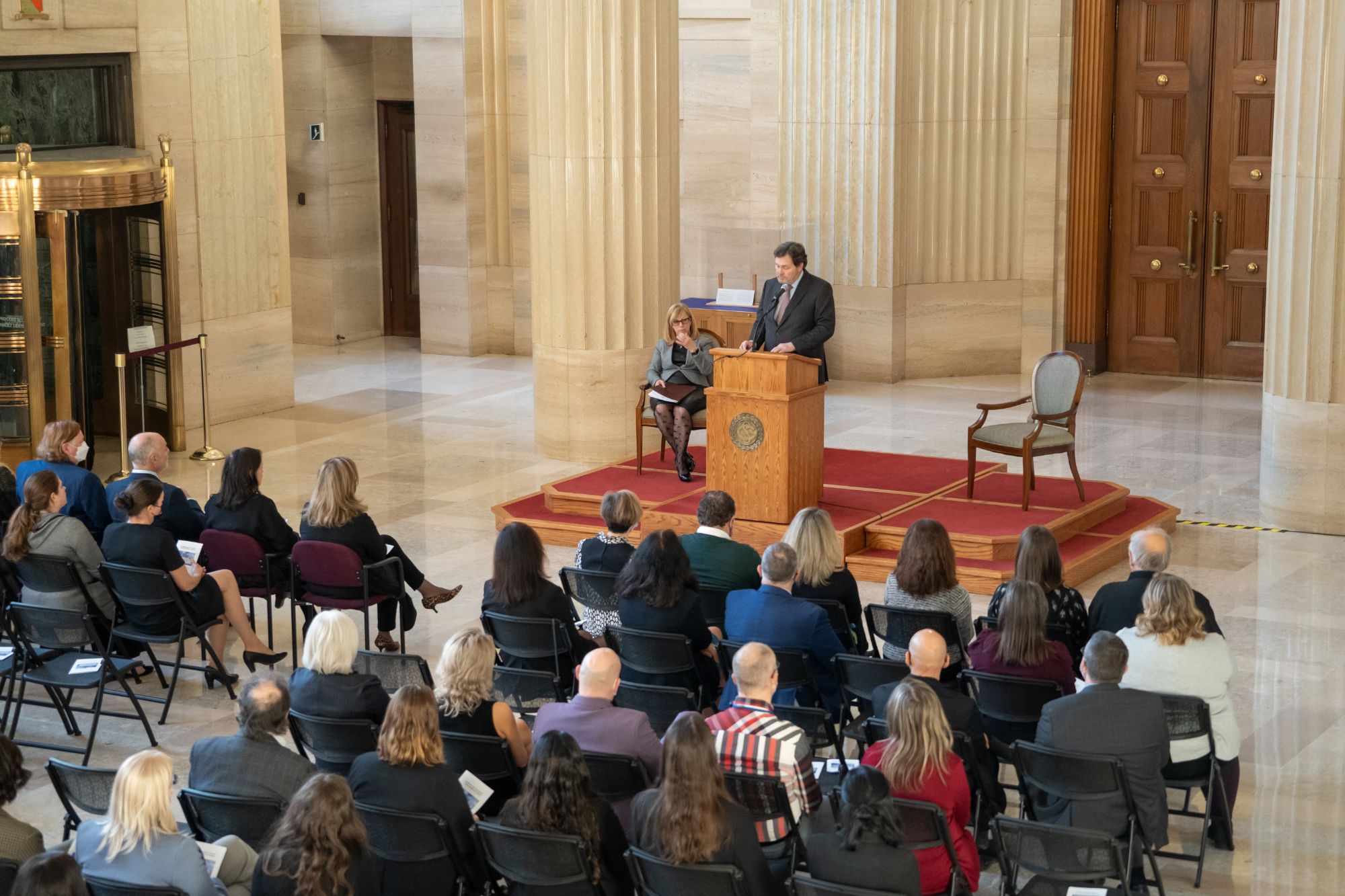 Chief Justice Wagner in front of employees