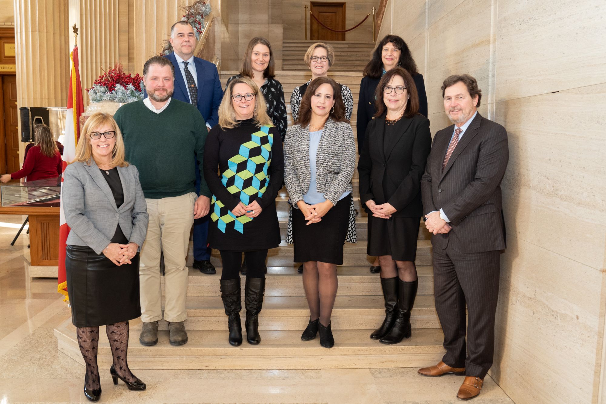 Chantal Carbonneau and Chief Justice Wagner with employees