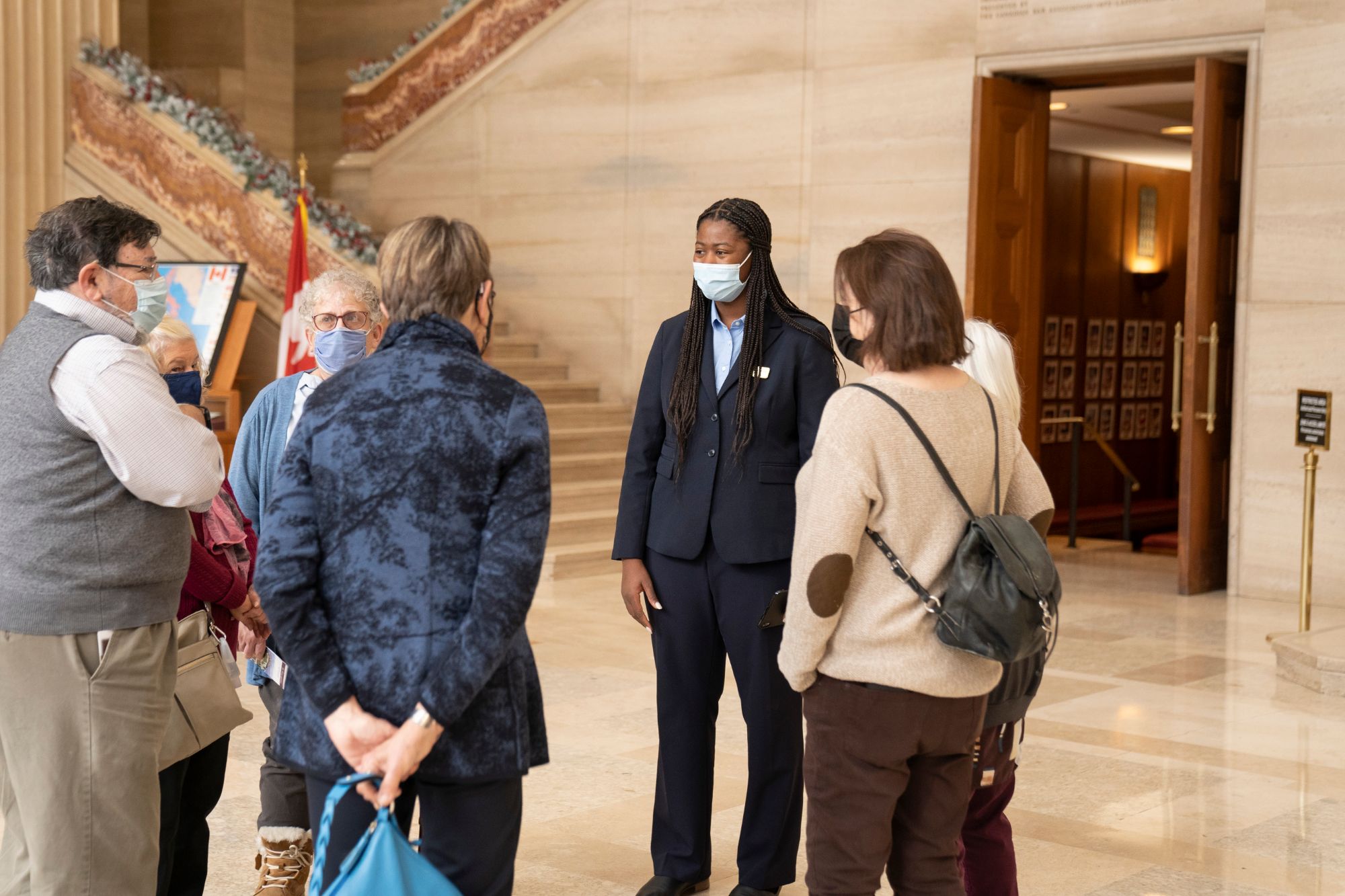 A tour interpreter with a group of visitors