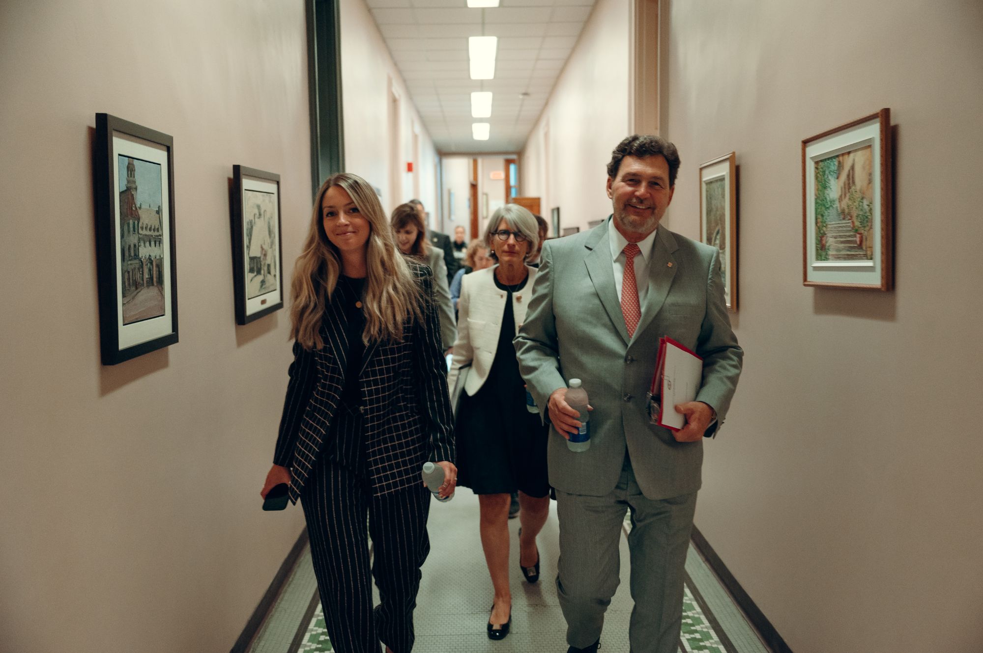 Chief Justice  Wagner walking with people